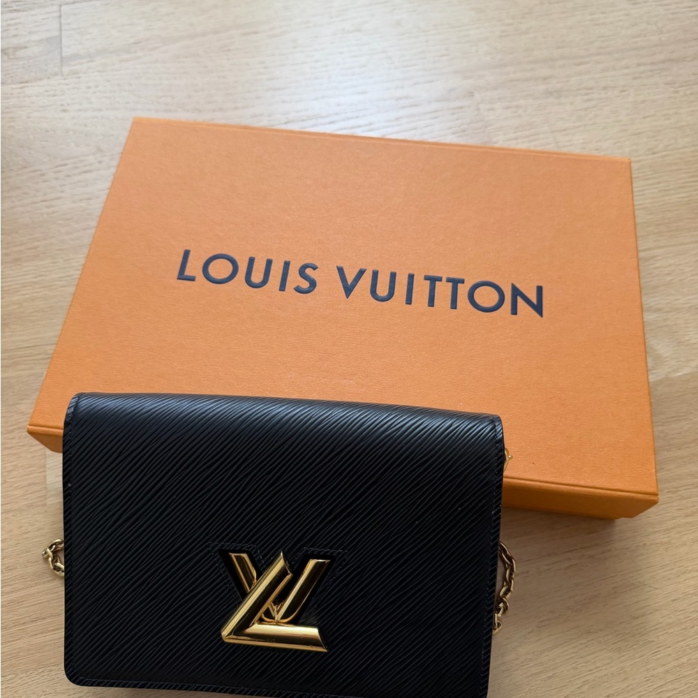 Louis Vuitton Black Clutch with Gold Accents